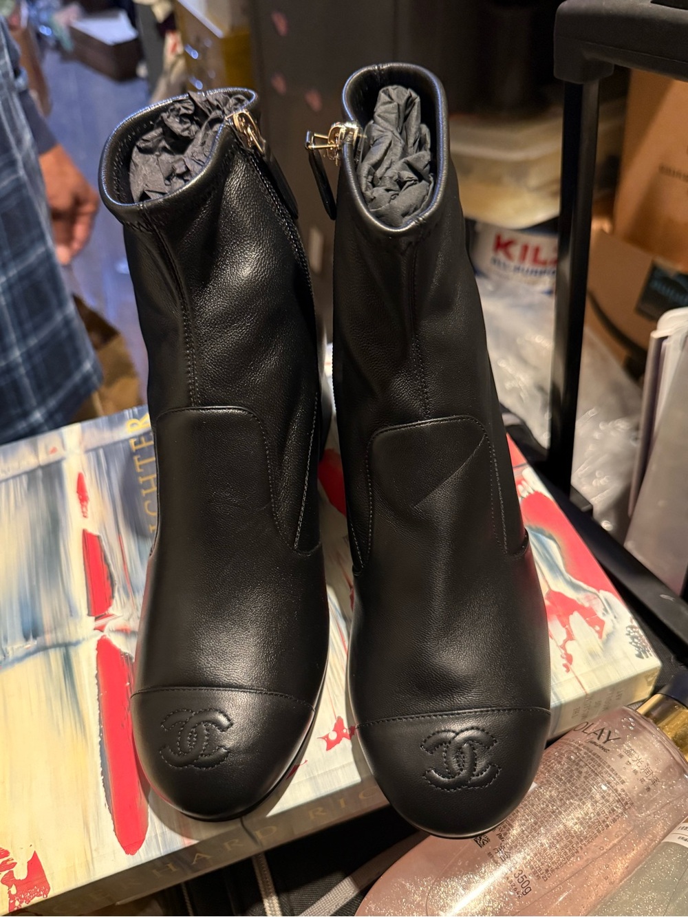 CHANEL UNIFORM Black Leather Ankle Booties with Gold Zipper Pull
